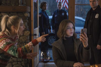 On Christmas Eve, I drove up for snow and silence—deed in my name, key in my hand. Then I froze: porch lights blinking, an American flag stirring on the rail, a white SUV I’m still paying for, and inside… voices and laughter—the sound of ownership that wasn’t mine.